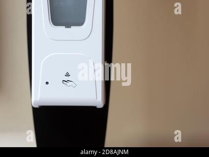 Automatic dispenser or sanitation station for hand hygiene Stock Photo