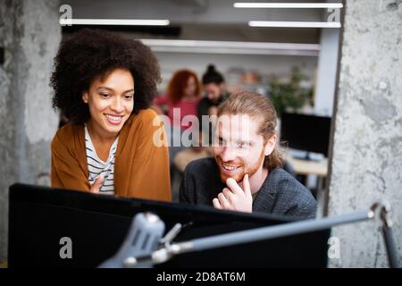 Group of young business people and designers.They working on new project.Startup concept. Stock Photo