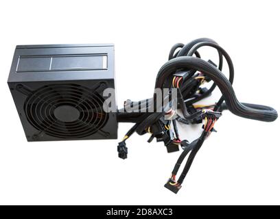 Single black power supply for PC with wires isolated on white a background Stock Photo
