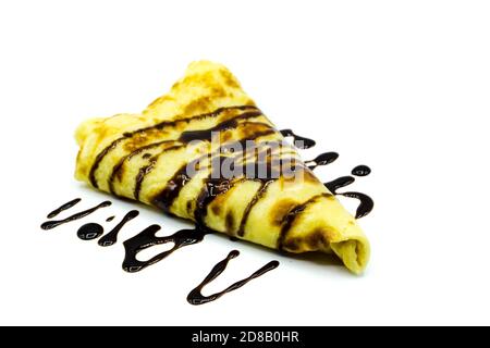 Crepes with chocolate sauce isolated on white background Stock Photo