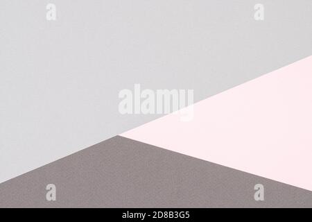 Abstract colored paper texture background. Minimal geometric shapes and lines in pastel pink and light gray colours Stock Photo