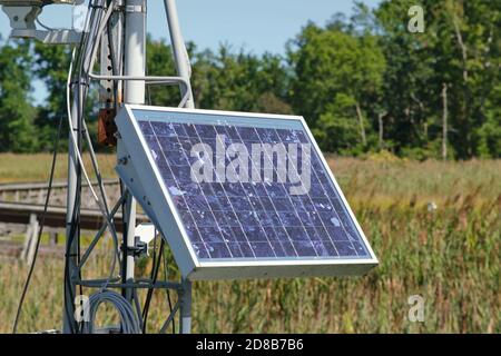 Automated weather and ecological data center solar panel, St. Jones Reserve, Dover, DE. Stock Photo
