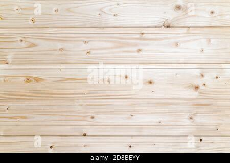 Surface wooden plank light yellow background with horizontal boards. Flat lay view of texture, close-up wooden pattern. Stock Photo