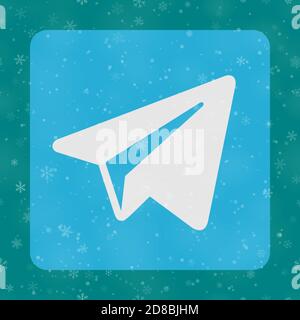 VORONEZH, RUSSIA - NOVEMBER 28, 2020: Telegram logo square icon on Christmas background of snowflakes in turquoise colors Stock Vector