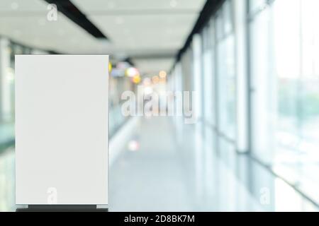 mock up of poster billboard stand sign in hall way or lobby representing advertisement of sale promotion discount for replacement blank canvas for Stock Photo