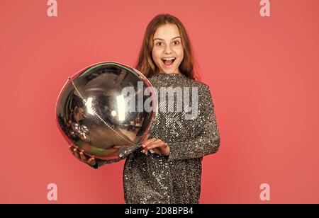 Shine bright like diamond. Silver decor. Metallic shining. Birthday girl. Happy child celebrate birthday. Small kid hold air balloon. Birthday anniversary celebration. Birthday party copy space. Stock Photo