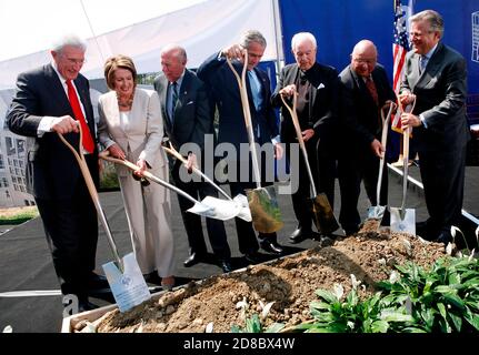 United States Institute of Peace President Richard H. Solomon,  House Speaker Nancy Pelosi (D-Calif.), former Secretary of States George P. Shultz, President George W. Bush, Reverend Theodore M. Hesburgh, unidentifed, Chairman of the Board of Directors, United States Institue of Peace J. Robinson West, dig the ground during a groundbreaking ceremony for the U.S. Institute of Peace's new headquarters and Public Education Center in Washington, DC, June 5, 2008.   Credit: Aude Guerrucci / Pool via CNP / MediaPunch Stock Photo