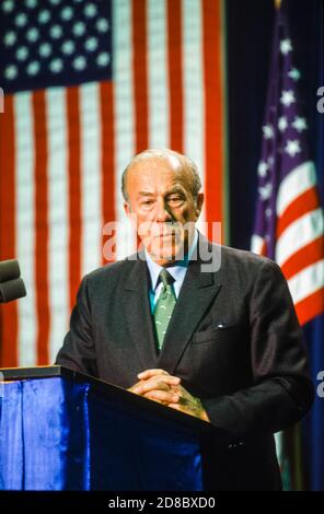 United States Secretary of State George P. Shultz answers reporter’s questions in New York, New York following the meeting between United States President Ronald Reagan, US President-elect George H.W. Bush and Chairman of the Presidium of the Supreme Soviet of the USSR Mikhail Gorbachev on December 7, 1988.Credit: Arnie Sachs / CNP / MediaPunch Stock Photo