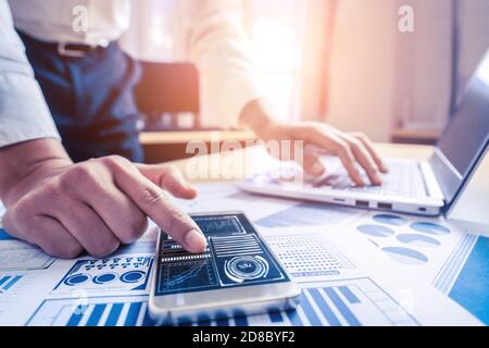 Businessman accountant or financial expert analyze business report graph and finance chart at corporate office. Concept of finance economy, banking Stock Photo