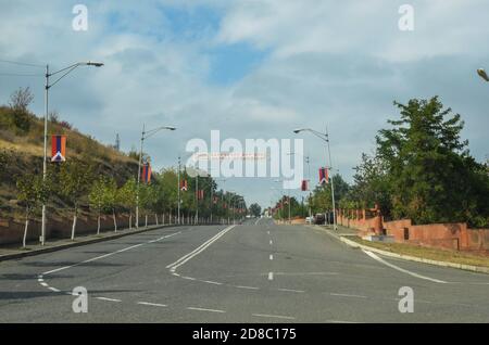 Empty road in Armenian capital of Stepanakert in Nagorno Karabakh. Disputed between Armenia and Azerbaijan after both countries became independent in 1991 when the Soviet Union collapsed, Nagorno-Karabakh is claimed for historical reasons. Stock Photo