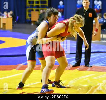 Orenburg, Russia - October 25-26, 2017: Girls compete in sports wrestling at the All-Russian tournament for the prizes of the Governor of Orenburg Reg Stock Photo