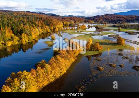 Aerial view of a Planina Plain in autumn colours, Karst plain in the Notranjska lowlands, flooded by Unica river that turned the plain into the lake Stock Photo