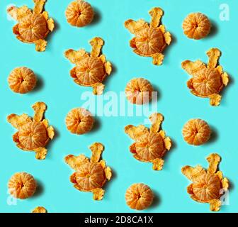 Seamless pattern of mandarin on blue background. Flat lay, top view. Stock Photo