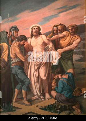 Stations of the Cross by an unknown artist in the handling of the Catholic pilgrimage church to the Holy Trinity in Kappl, Waldsassen, Tirschenreuth County, Upper Palatinate, Bavaria, Germany. 10 Station - Jesus is robbed of his clothes  /  Kreuzwegstationen eines unbekannten Künstlers im Umgang der katholischen Wallfahrtskirche zur Heiligsten Dreifaltigkeit in Kappl, Waldsassen, Landkreis Tirschenreuth, Oberpfalz, Bayern, Deutschland. 10 Station - Jesus wird seiner Kleider beraubt Stock Photo