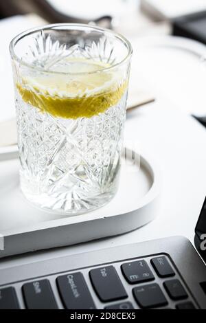 Real workspace close-up shot, tabletop with laptop keyboard Stock Photo