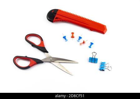 Schoolboy student stationery set pins paper clips scissors, on white isolated background Stock Photo