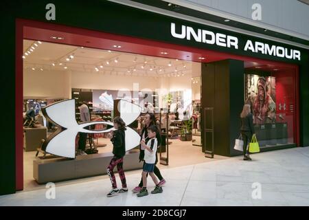 AUCKLAND, NEW ZEALAND - Oct 07, 2019: View of Under Armour sports clothing and athletic shoes store in Westfield Newmarket Shopping Centre mall Stock Photo