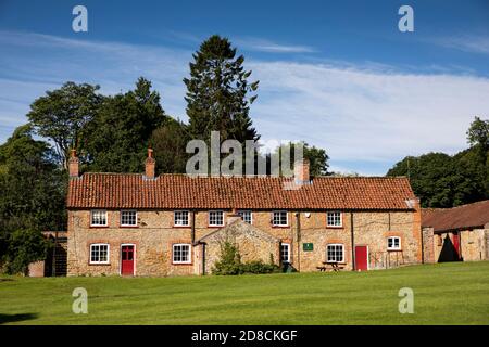 UK, England, Lincolnshire Wolds, Stainton le Vale, Stainton Hall, Sutton Estate houses on road to Caistor Stock Photo