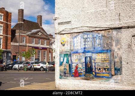 UK, England, Lincolnshire Wolds, Louth, Queen Street, painted mural on wall of Scotts Jewellers leading to Market Place Stock Photo