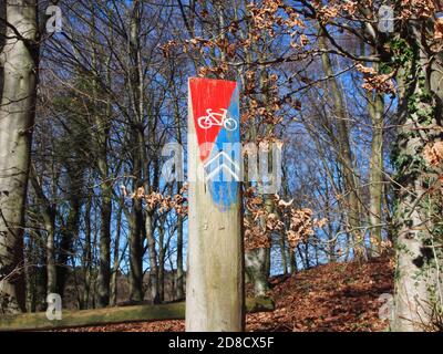 A sign post showing the route of a mountain bike cycle route Stock Photo
