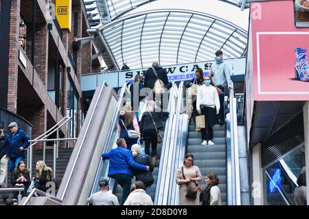 People shopping during pandemic times in Cabot Circus Bristol, UK. Stock Photo