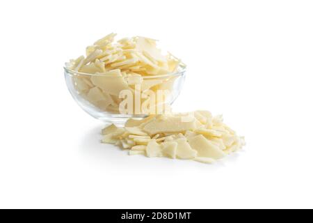 Grated white chocolate. Chocolate flakes isolated on a white background. Stock Photo