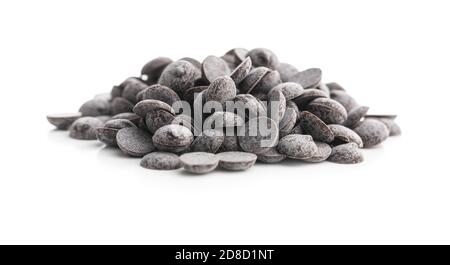 Dark chocolate lentils isolated on a white background. Stock Photo