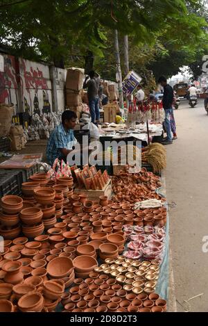 October 28, 2020, Guwahati, Assam, India: A vendor wait for customer to sell different puja items  on the eve of  Hindu  festival Lakshmi puja in   Guwahati Assam India  on Thursday 29th October 2020.Lakshmi Puja in honour of the Hindu Goddess of wealth which is observed just after Durga Puja (Credit Image: © Dasarath Deka/ZUMA Wire) Stock Photo