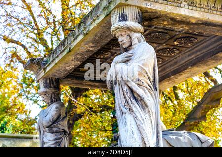 Close-up of Indian bearer statue at the grave of Major General Sir William Casement at Kensal Green Cemetery in autumn, London, UK Stock Photo