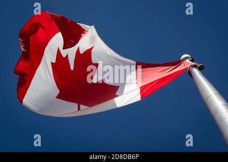 A Canadian flag pictured in Ottawa, Ontario on Saturday, September 12, 2020. Stock Photo