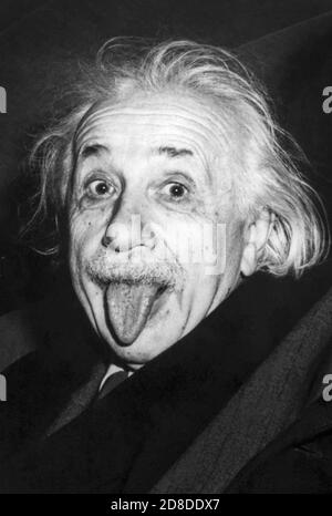 Iconic photo of Albert Einstein sticking out his tongue on the occasion of his 72nd birthday party at Princeton University on March 14, 1951. (Photo by Arthur Sasse) Stock Photo