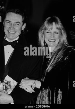 Twiggy and her husband Leigh Lawson attend the 'Gorillas in the Mist' premiere on January 24, 1989 in London, England. Stock Photo