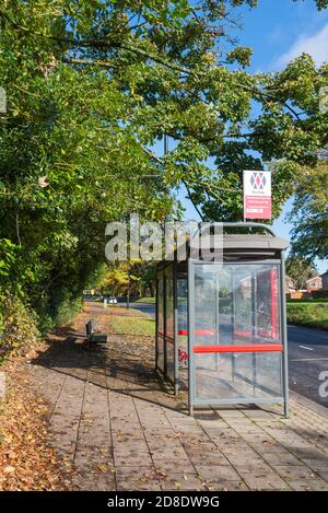 National Express West Midlands bus stop shelter in Harborne, Birmingham in autumn Stock Photo