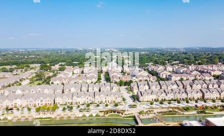 New development riverside townhomes and apartment complex in downtown Flower Mound, Texas, USA Stock Photo