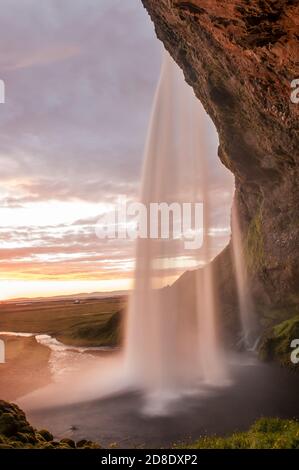 Seljalandsfoss is one of the most beautiful waterfalls on the Iceland. It is located on the South of the island. This photo is taken during the incred Stock Photo
