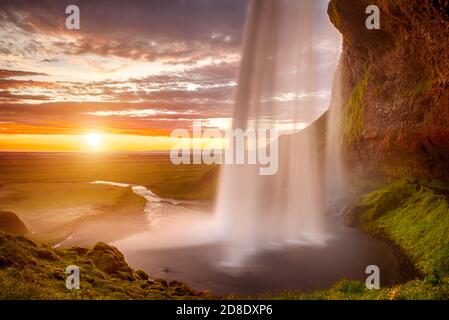 Seljalandsfoss is one of the most beautiful waterfalls on the Iceland. It is located on the South of the island. This photo is taken during the incred Stock Photo