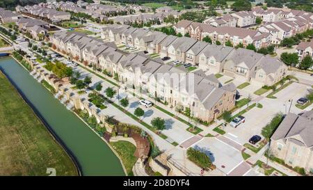 New development riverside townhomes and apartment complex in downtown Flower Mound, Texas, USA Stock Photo