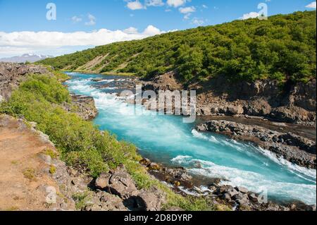 Hvita river with a incredibly blue water near Hraunfossar waterfalls, Iceland Stock Photo