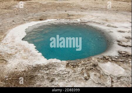 Incredibly blue small pool at Hveravellir is actually a hot geothermal spring in the heart of Iceland. Stock Photo