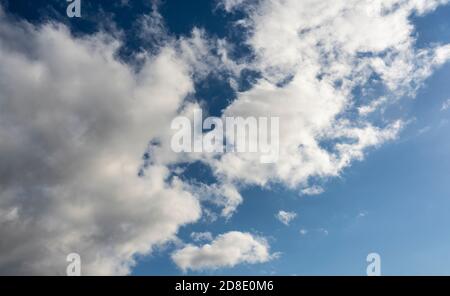 Alto cumulus clouds in deep blue sky Stock Photo