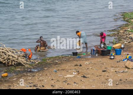 View of african women washing Clothes, and themselves in the Niger River, Segou, Mali Stock Photo