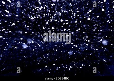 snow texture on black background. winter background Stock Photo