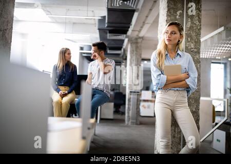 Company employees working in software development and designer office Stock Photo
