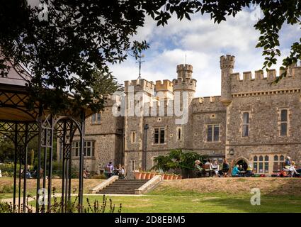UK, Kent, Whitstable, Tower Hill, Whitstable Castle and gardens, customers on cafe lawn