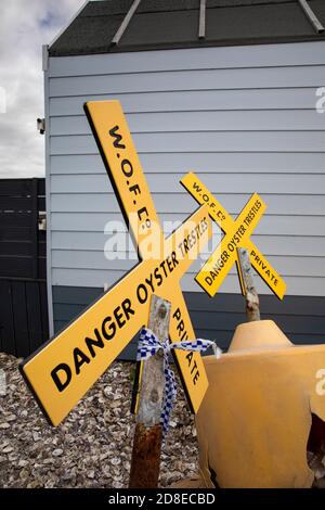 UK, Kent, Whitstable, Harbour, East Quay, yellow oyster bed warning buoys Stock Photo