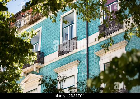 Azulejos tiles on the exterior of houses in the Alfama - Lisbon, Portugal, Europe. Stock Photo