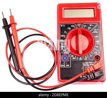 Red multimeter device with lcd screen for measuring electricity, isolated on a white background Stock Photo