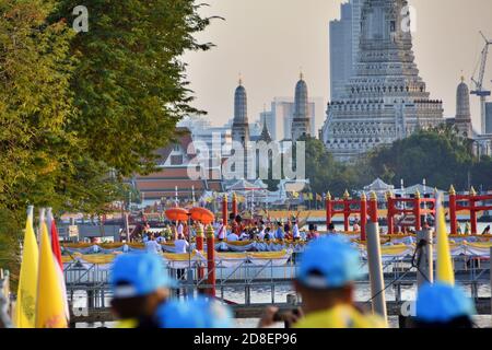 Thailand King Rama 10's coronation, two Thai princesses disembarked the Royal Barge Procession at Ratchaworadit pier with Wat Arun in the background. Stock Photo