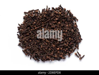 pile of whole cloves close up  isolated on a white background Stock Photo