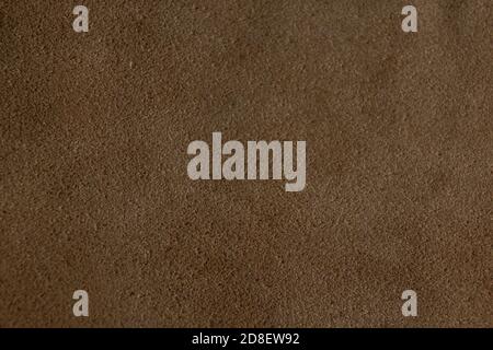 beige brown rough natural Suede texture background close up Stock Photo